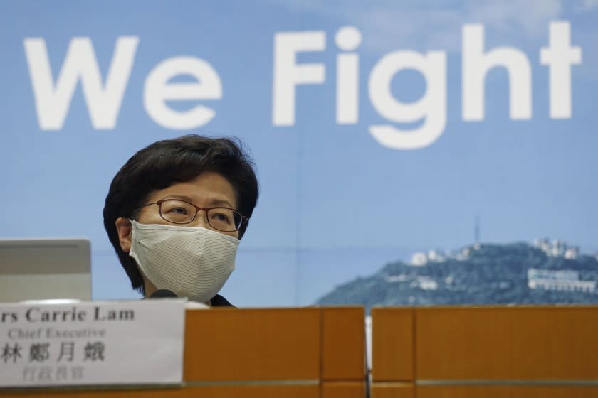 Hong Kong Chief Executive Carrie Lam speaks during a press conference in Hong Kong, Friday, July 31, 2020. She announced to postpone legislative elections scheduled for Sept. 6, citing a worsening coronavirus outbreak. (AP Photo/Kin Cheung)