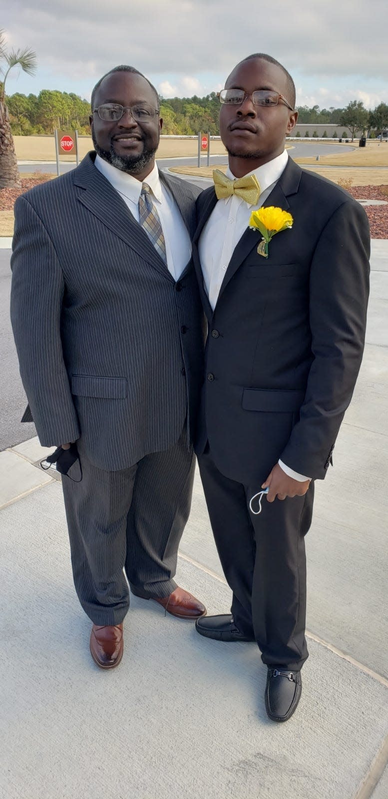 Michael Anthony Yeldon Sr. (left) poses with his son Michael Anthony Yeldon Jr. (right).