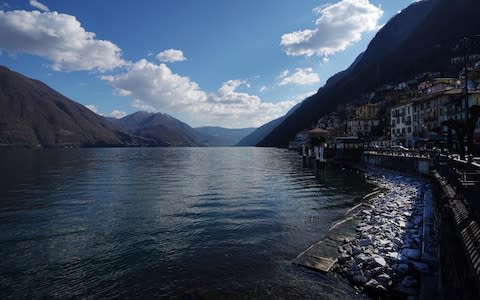 The fire broke out near a village on the shores of Lake Como in northern Italy - Credit: Vittorio Celotto/Getty