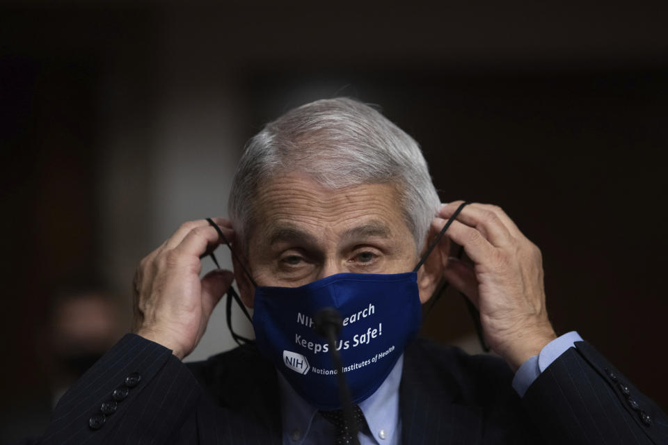 Dr. Anthony Fauci, Director of the National Institute of Allergy and Infectious Diseases at the National Institutes of Health, listens during a Senate Senate Health, Education, Labor, and Pensions Committee Hearing on the federal government response to COVID-19 on Capitol Hill Wednesday, Sept. 23, 2020, in Washington. (Graeme Jennings/Pool via AP)