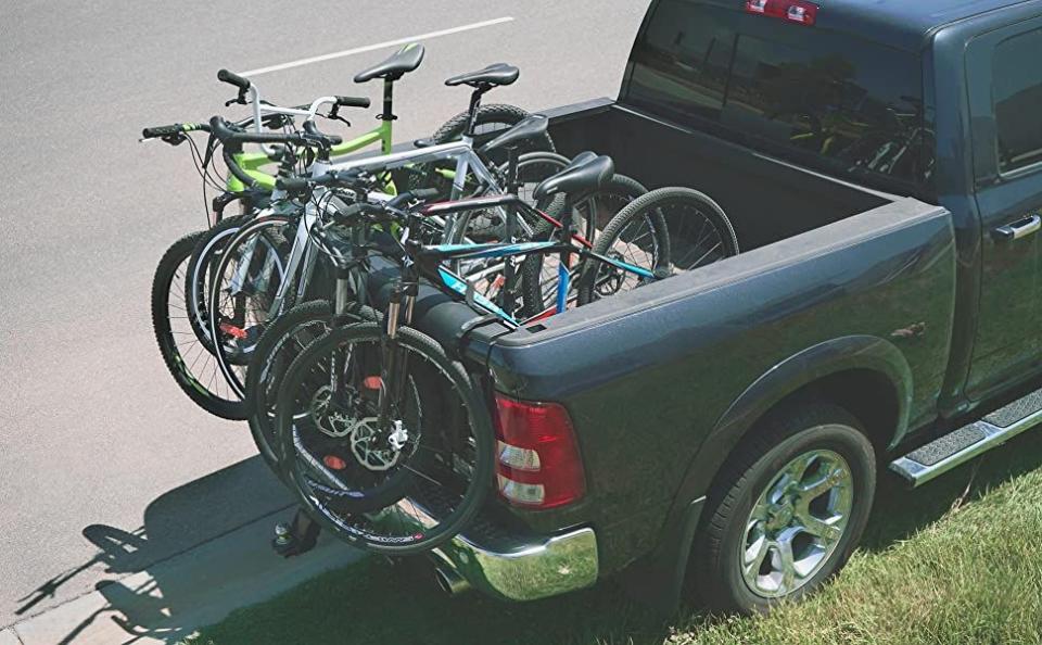 bikes mounted in the bed of a pickup truck
