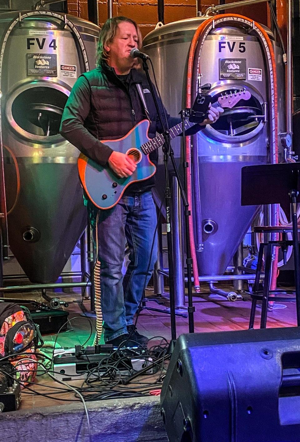 David Spires performing at a local venue.
