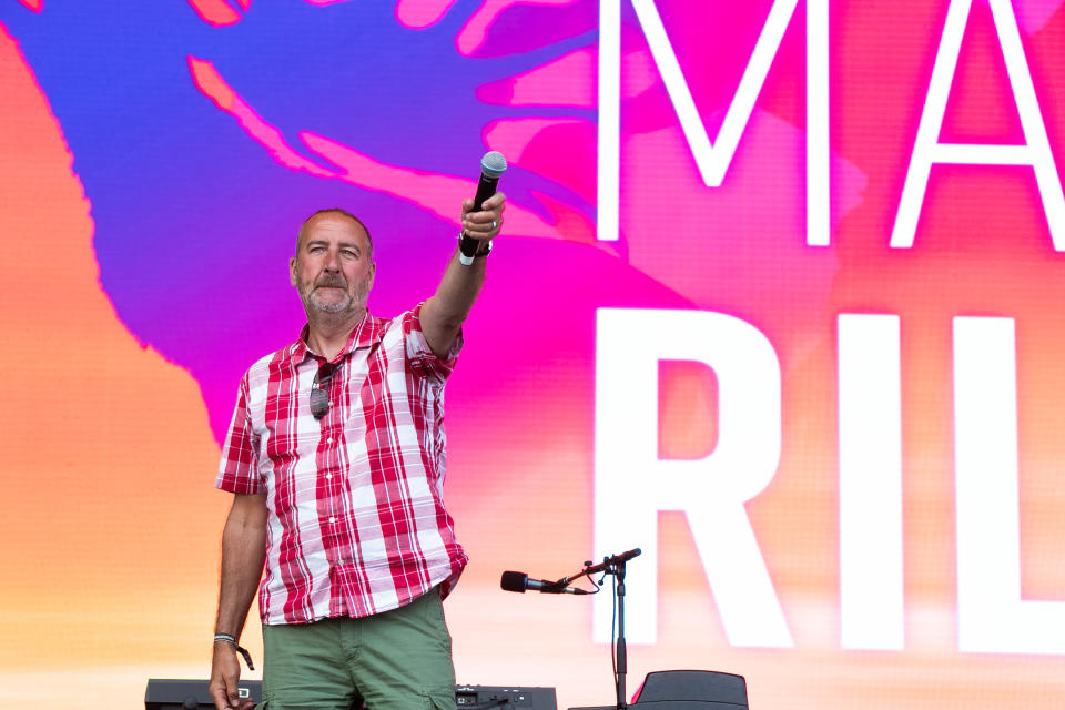 BELFAST, NORTHERN IRELAND - MAY 25:  Marc Riley introduces Courtney Barnett for her performance at the BBC Biggest Weekend at Titanic Slipways on May 25, 2018 in Belfast, Northern Ireland.  (Photo by Kieran Frost/Redferns)