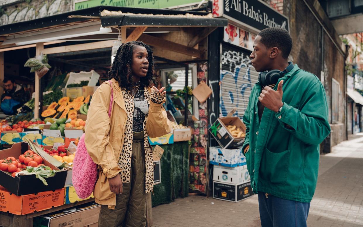 A still from Rye Lane; a bubbly, technicolour romcom that washes the south-east London neighbourhood in rainbow hues - Chris Harris