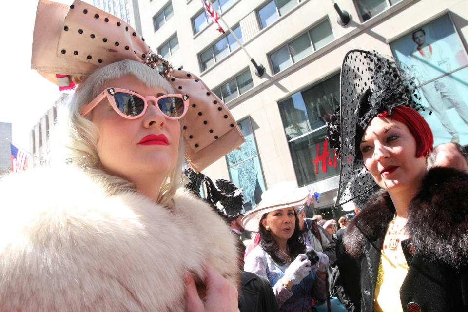 Dressed for the occasion, Sara Bender, left, and Gin Minsky, right, take part in the Easter Parade along New York's Fifth Avenue, Sunday, April 20, 2014. (AP Photo/Tina Fineberg)