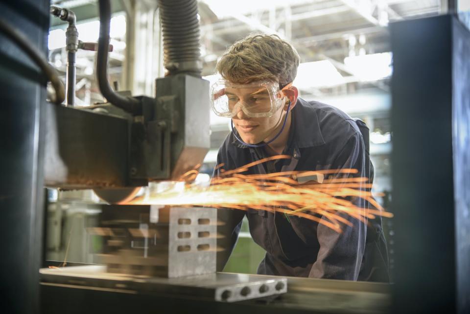 <span class="caption">It’s hard not to notice the difference in the way the government has treated male dominated apprenticeships versus the female dominated care worker industry.</span> <span class="attribution"><a class="link " href="https://www.gettyimages.com.au/detail/photo/automotive-apprentice-wearing-boiler-suit-and-royalty-free-image/165527767?adppopup=true" rel="nofollow noopener" target="_blank" data-ylk="slk:Getty Images;elm:context_link;itc:0;sec:content-canvas">Getty Images</a></span>