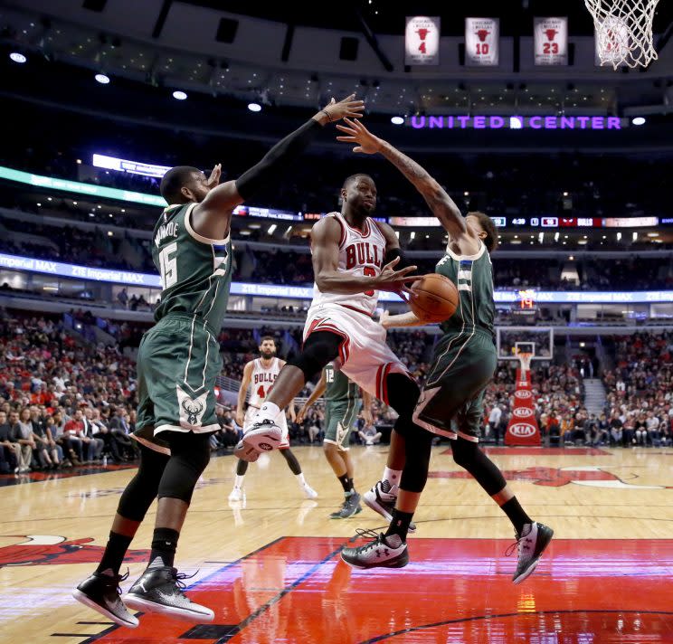 Wade splits the defense against Milwaukee on Monday. (AP)