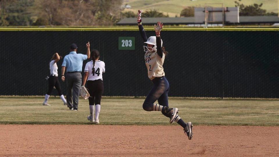 Mikaylee Gordon celebrates as the ball is ruled a home run. Mission Prep won 7-0 over San Luis Obispo High School in a softball playoff on May 15, 2024.