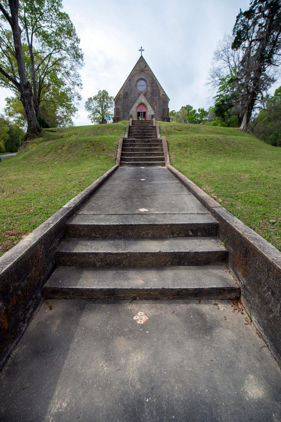 Under renovation, Christ Episcopal Church In Church Hill, Mississippi stands like a beacon atop a terraced hill where it has been since 1857.