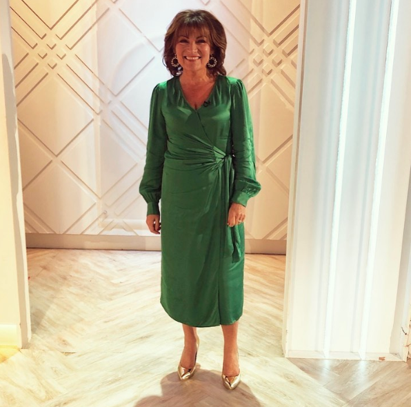 Lorraine glams up in green satin dress