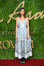 <p>Alexa Chung looked prim in a powder blue dress from her own label. She finished the look with a berry-hued lip and forest green shoes. (Photo: Getty Images) </p>