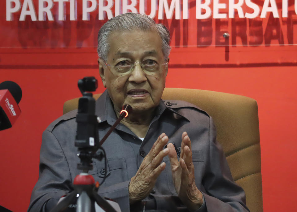 Former Prime Minister Mahathir Mohamad speaks during a press conference at his party headquarters in Petaling Jaya, Malaysia, Friday, May 29, 2020. Mahathir has been ousted from his Malay party in the latest twist to a power struggle with his successor Muhyiddin Yassin, but he has vowed to challenge it. (AP Photo)