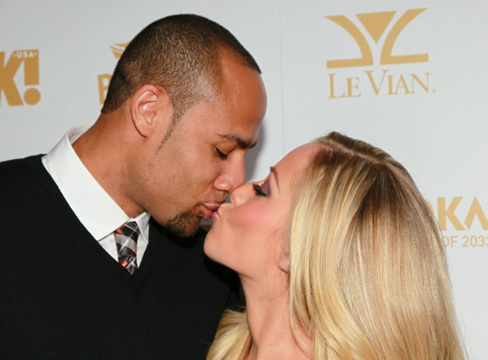 Kendra is married to footballer Hank Baskett. Copyright: [Getty]