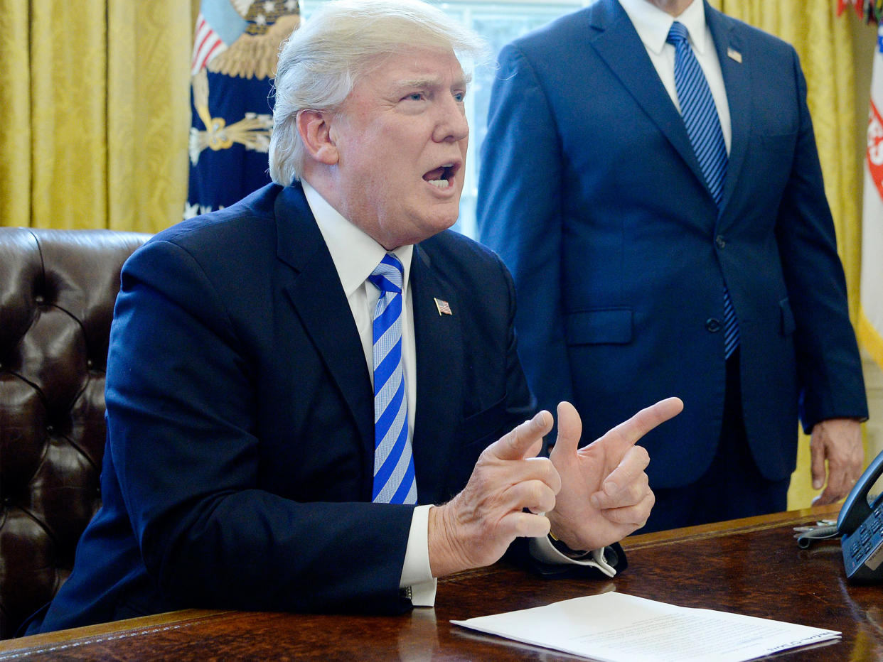 President Donald Trump reacts after Republicans pulled their health care bill from the House floor: Getty