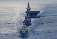 British frigate HMS Argyle (front), Japanese destroyer Inazuma (C) and Japanese helicopter carrier Kaga take part in a joint naval drill in the Indian Ocean, September 26, 2018. Picture taken September 26, 2018. REUTERS/Kim Kyung-Hoon