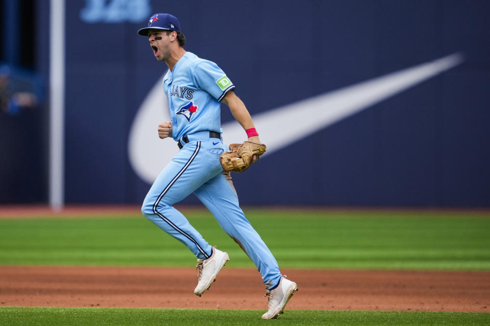 Toronto Blue Jays shortstop Ernie Clement (28) reacts after getting the out at second base on a pick-off play against the Washington Nationals during fifth inning MLB interleague baseball action in Toronto on Wednesday, Aug. 30, 2023. (Andrew Lahodynskyj/The Canadian Press via AP)