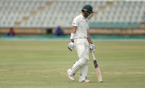 Zimbabwe batsman Craig Ervine walks off the pitch after been dismissed during the test cricket match against Sri Lanka at Harare Sports Club, in Harare, Wednesday, Jan. 29, 2020. (AP Photo/Tsvangirayi Mukwazhi)