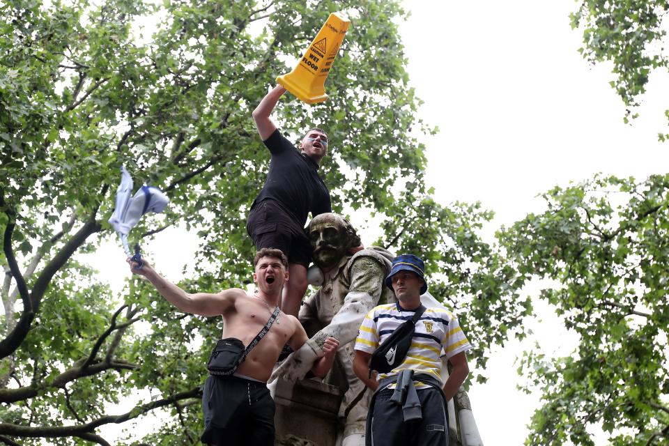 Scotland fans gather in Leicester Square (PA)