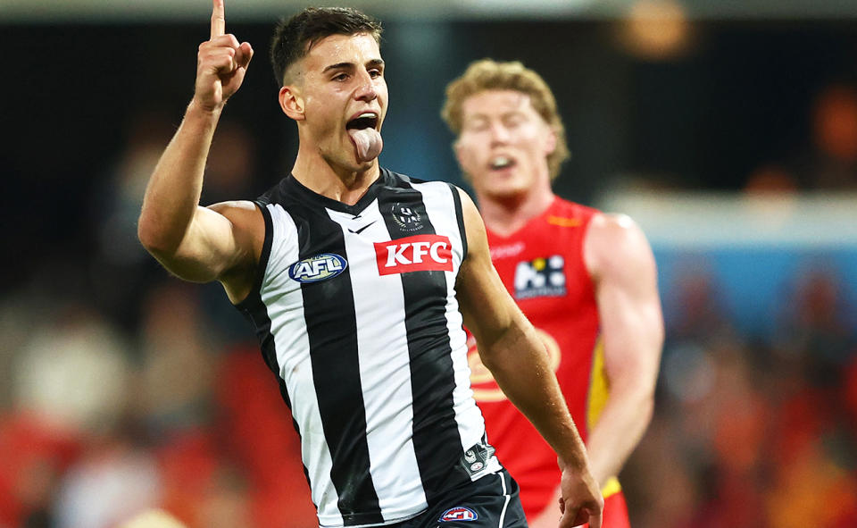 Nick Daicos in action for Collingwood against the Suns. 