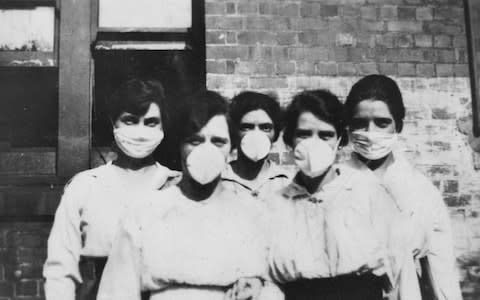 Women wearing masks in Australia - Credit: BBC