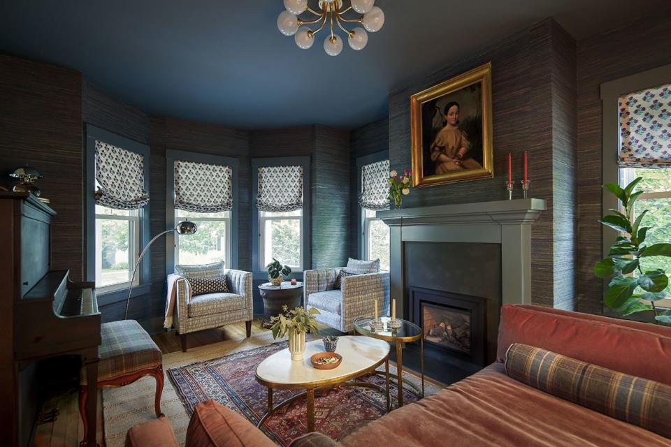 a living room with a fireplace