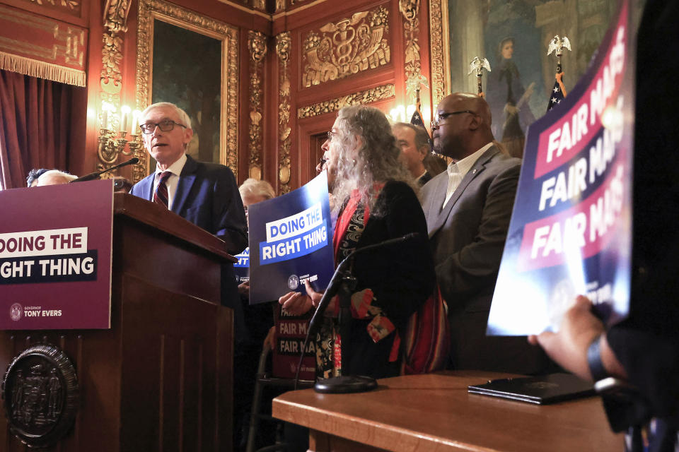 Wisconsin Gov. Tony Evers speaks before signing into law the state's re-drawn legislative maps at the Wisconsin State Capitol in Madison, Wis., Monday, Feb. 19, 2024. (AP Photo/John Hart, Wisconsin State Journal)