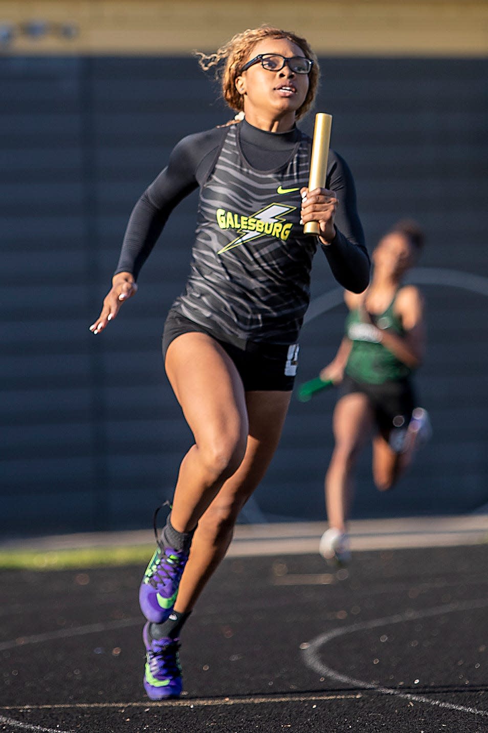 Galesburg's Syriah Boyd makes the turn as she competes in the 4x200 meter relay during the Silver Streaks' track and field meet with Richwoods and Manual on Tuesday, May 11, 2021 at Van Dyke Field.