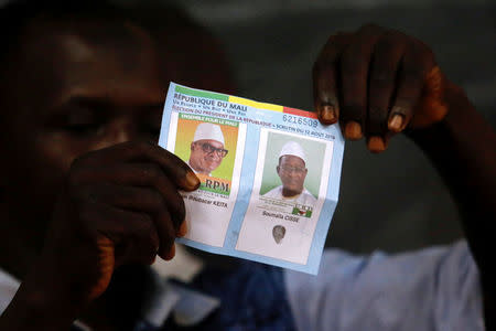 Election workers start the counting of the ballots during a run-off presidential election in Bamako, Mali August 12, 2018. REUTERS/Luc Gnago