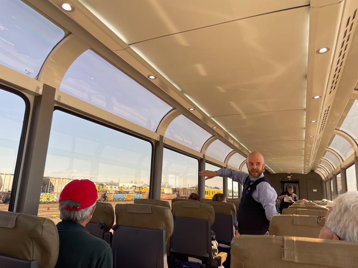 A train host shares facts about Denver, Colorado.