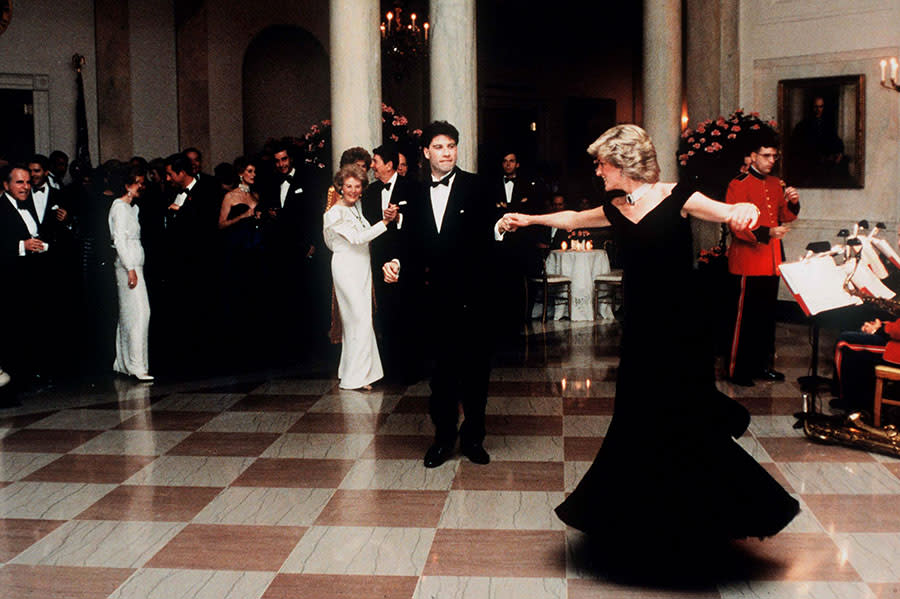 The Princess Of Wales dancing with John Travolta at The White House, in A midnight blue velvet dress by fashion designer Victor Edelstein. (Photo by Tim Graham Picture Library/Getty Images)