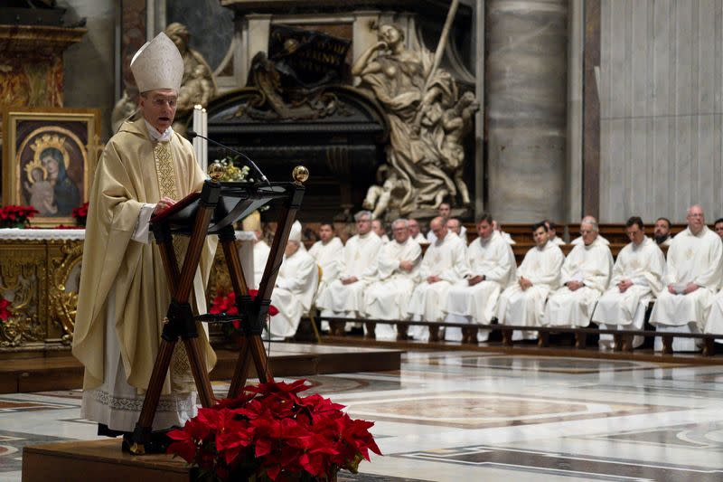 Benedict's top aide leads mass in memory of Pope Emeritus