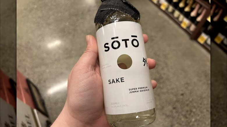 Sōtō sake bottle in hand