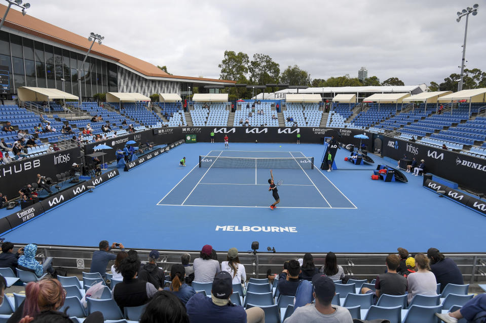 Japan's Kei Nishikori serves to Spain's Pablo Carreno Busta during their first round match at the Australian Open tennis championship in Melbourne, Australia, Monday, Feb. 8, 2021.(AP Photo/Andy Brownbill)