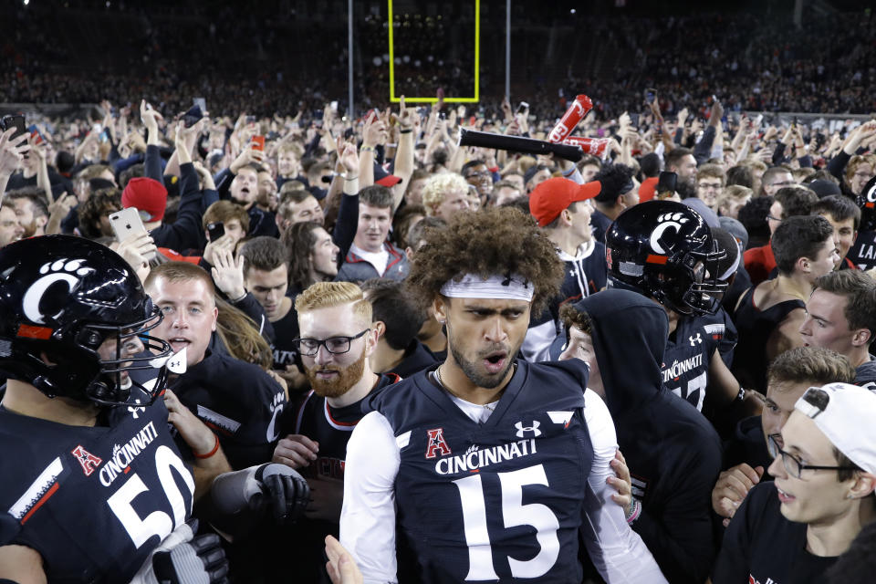 Cincinnati wide receiver Garyn Prater (15) celebrates after the team's 27-24 win over UCF in an NCAA college football game Friday, Oct. 4, 2019, in Cincinnati. (AP Photo/John Minchillo)