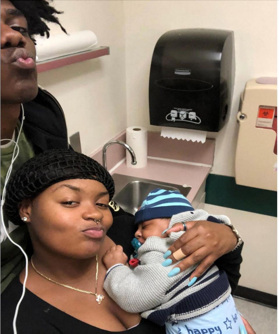 Quincy Pierre and Breeona Major at a pediatric visit ten days before his death.