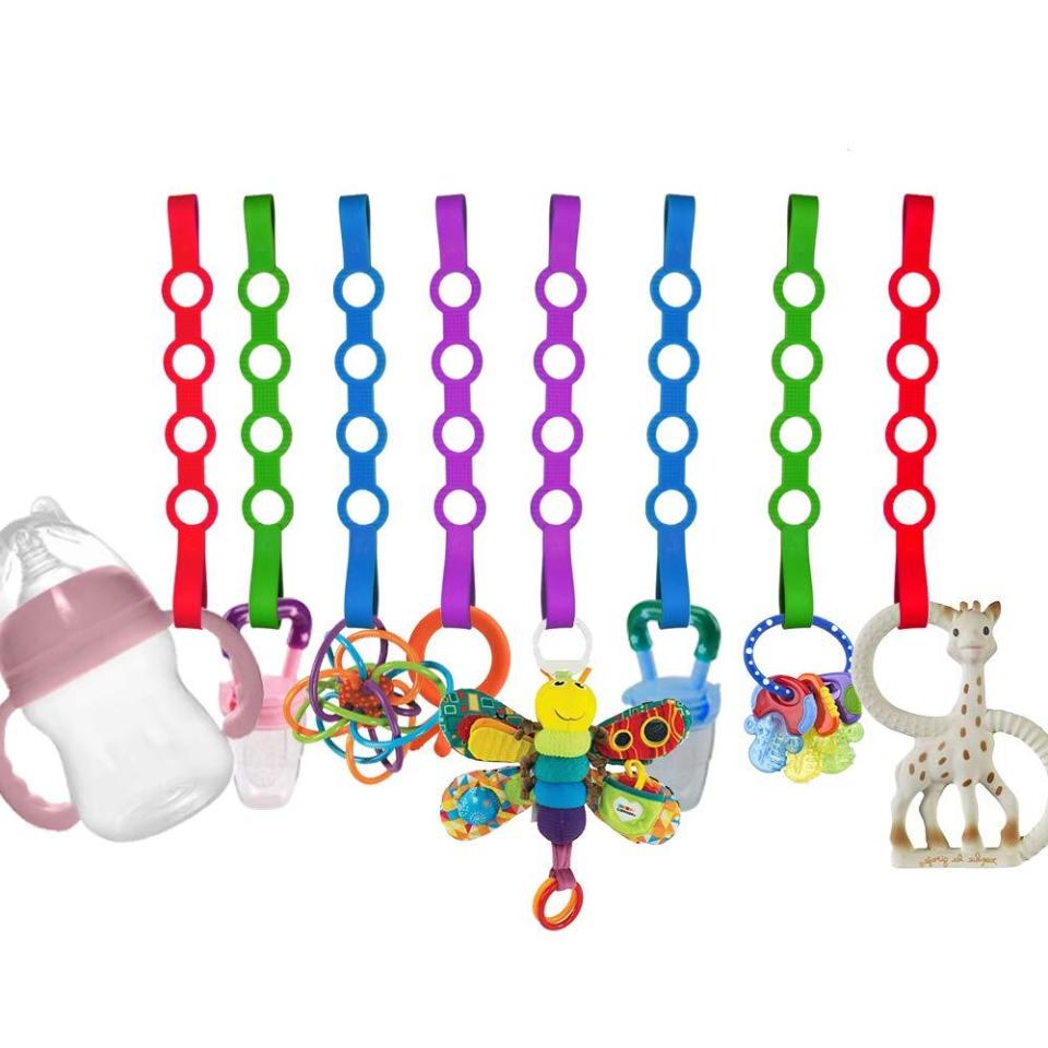 These handy accessories will help keep pacifiers, toys and bottles from falling on the ground, getting lost or becoming dirty. Plus, they cut down on how much bending down and crawling around you'll have to do.<br /><br /><strong>Promising review:</strong> "My son is like any kid out there. Loves throwing toys and bottles and water. You name it. He loves to throw it all. He especially finds it hilarious when mommy and daddy have to get the toys and stuff over and over. This is awesome! <strong>Easy to clean easy to use and if he bites it, it won&rsquo;t rip or anything. Perfectly safe.</strong> Definitely wash before use! Keeps bottles and water from falling. I&rsquo;ve used it on his tablet too! It&rsquo;s awesome! I have nothing bad to say except this is A MUST BUY! It will save you the headaches and the wondering where everything went." &mdash; <a href="https://amzn.to/3mUPKZV" target="_blank" rel="nofollow noopener noreferrer" data-skimlinks-tracking="5669346" data-vars-affiliate="Amazon" data-vars-href="https://www.amazon.com/gp/customer-reviews/R36GN6S395WVXZ?tag=bfjohn-20&amp;ascsubtag=5669346%2C2%2C22%2Cmobile_web%2C0%2C0%2C0" data-vars-keywords="cleaning" data-vars-link-id="0" data-vars-price="" data-vars-retailers="Amazon">Glamorous Mama</a> <br /><br /><strong>Get it from Amazon for <a href="https://amzn.to/3mO1A8i" target="_blank" rel="nofollow noopener noreferrer" data-skimlinks-tracking="5669346" data-vars-affiliate="Amazon" data-vars-asin="B07HMLH48D" data-vars-href="https://www.amazon.com/dp/B07HMLH48D?tag=bfjohn-20&amp;ascsubtag=5669346%2C2%2C22%2Cmobile_web%2C0%2C0%2C7256037" data-vars-keywords="cleaning" data-vars-link-id="7256037" data-vars-price="" data-vars-product-id="16453831" data-vars-product-img="https://m.media-amazon.com/images/I/51HGE9HwPNL.jpg" data-vars-product-title="Baby Toy Straps, 8 Pack Stretchable Silicone Pacifier Clips Baby Toddler Toy Bottle Harness Straps for Strollers,Highchair,Shopping Trolley,Cars,Hanging Baskets,Cribs,Bags" data-vars-retailers="Amazon">$9.99+</a> (available in five- or eight-packs).</strong>