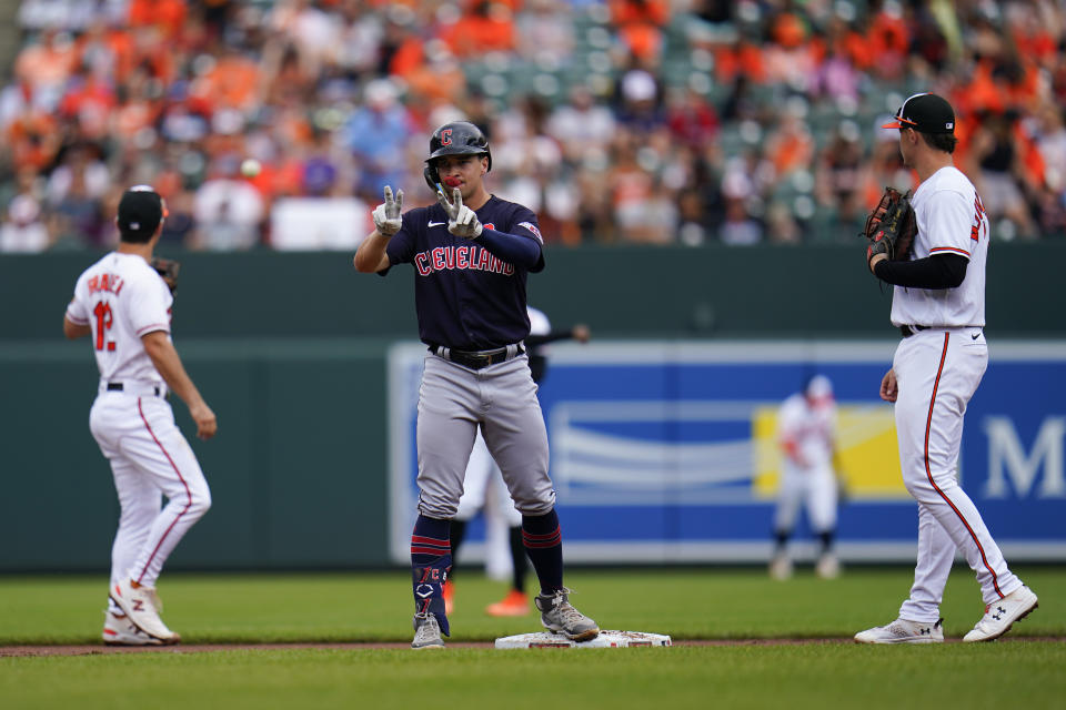 Cleveland Guardians' Will Brennan reacts after hitting a double against the Baltimore Orioles during the second inning of a baseball game, Monday, May 29, 2023, in Baltimore. (AP Photo/Julio Cortez)