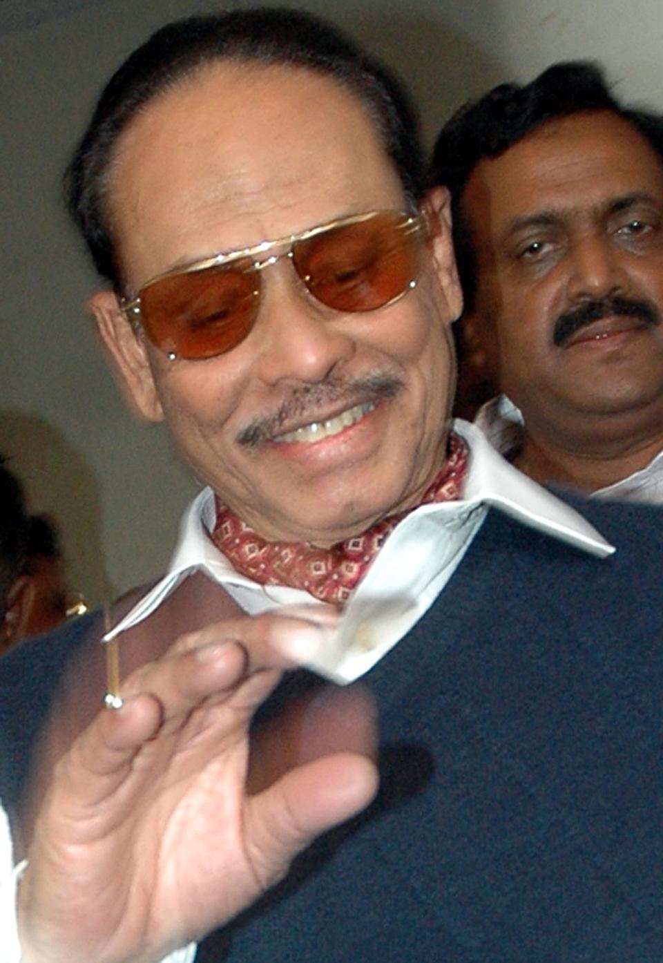 FILE- In this Jan. 17, 2007 file photo, former Bangladesh President Hussain Muhammad Ershad enters a court in Dhaka, Bangladesh. The former military dictator who seized power in a 1982 coup, has died. He was 91. (AP Photo/Pavel Rahman, File)