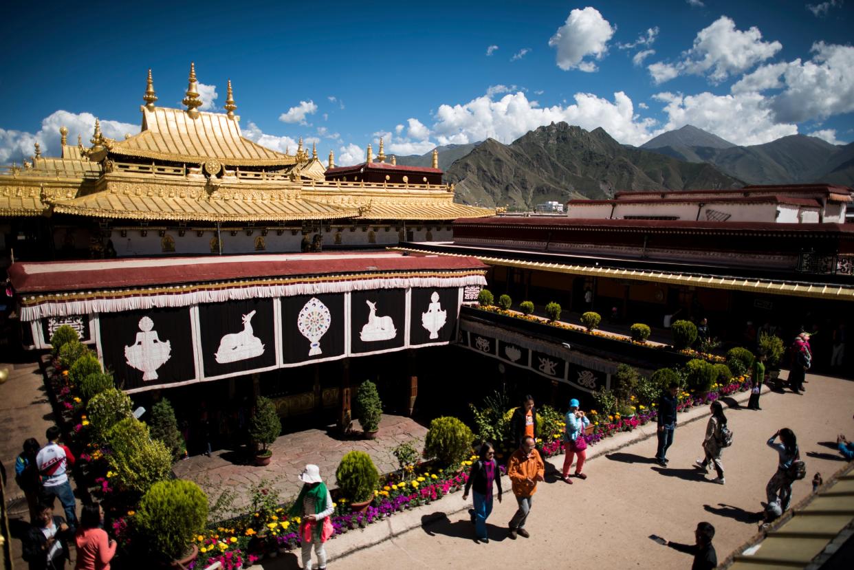 The Jokhang temple in Lhasa is one of Tibetan Buddhism's most hallowed sites. (Photo: JOHANNES EISELE via Getty Images)