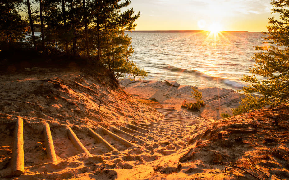 <p>St. Joseph, Muskegon, Grand Haven. Come summer, locals crowd these lakefront towns in the state’s southwestern corner, but the northern tip is still relatively undiscovered. Along the Michigan and Canada border is <a rel="nofollow noopener" href="https://www.nps.gov/piro/index.htm" target="_blank" data-ylk="slk:Pictured Rocks National;elm:context_link;itc:0;sec:content-canvas" class="link ">Pictured Rocks National </a><a rel="nofollow noopener" href="http://www.jetsetter.com/feature/unexpected-beaches" target="_blank" data-ylk="slk:Lakeshore;elm:context_link;itc:0;sec:content-canvas" class="link ">Lakeshore</a>, which has colorful sandstone cliffs, scenic waterfalls and large dunes. Our advice? Pack the hiking boots with the bathing suits. And when hunger strikes, head to <a rel="nofollow noopener" href="http://fallingrockcafe.com/" target="_blank" data-ylk="slk:Falling Rock;elm:context_link;itc:0;sec:content-canvas" class="link ">Falling Rock</a>, a charming bookstore and cafe that serves smoothies and sandwiches.</p>