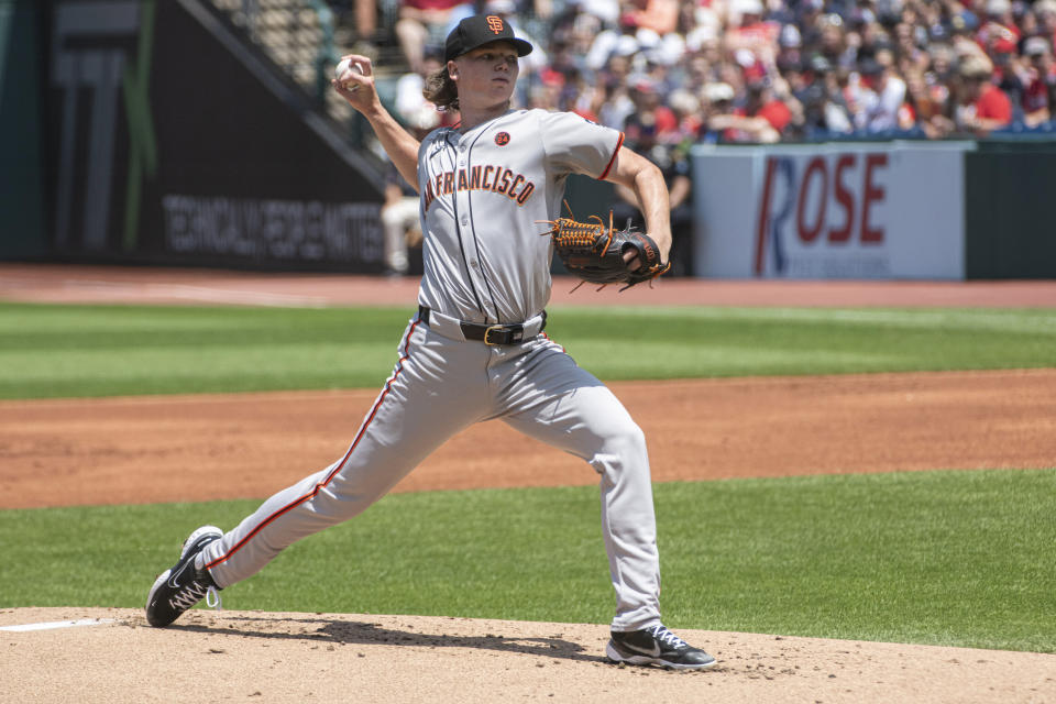 San Francisco Giants starting pitcher Hayden Birdsong delivers against the Cleveland Guardians during the first inning of a baseball game in Cleveland, Sunday, July 7, 2024. (AP Photo/Phil Long)