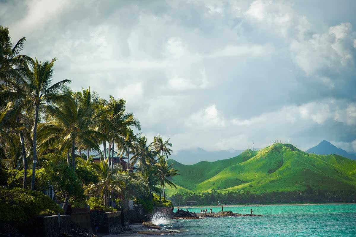 The peaceful bay looks out onto the nearby Mokulu Islands (Getty Images/iStockphoto)