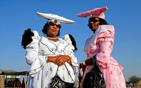 Tribespeople still dress in 19th century German outfits as an act of subversion - Credit: ALAMY
