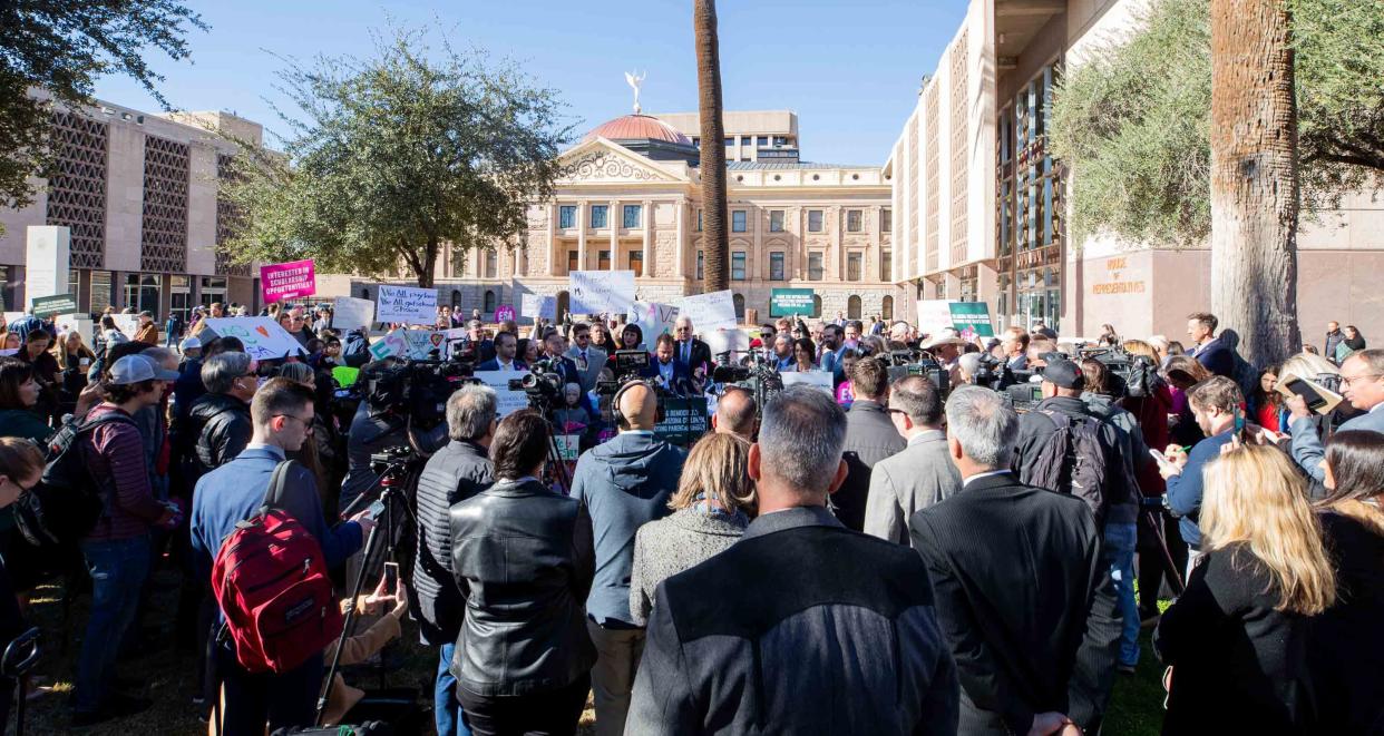 The Freedom Caucus and school voucher supporters gather for a news conference outside the Arizona state Senate building in Phoenix on Jan. 8, 2024.