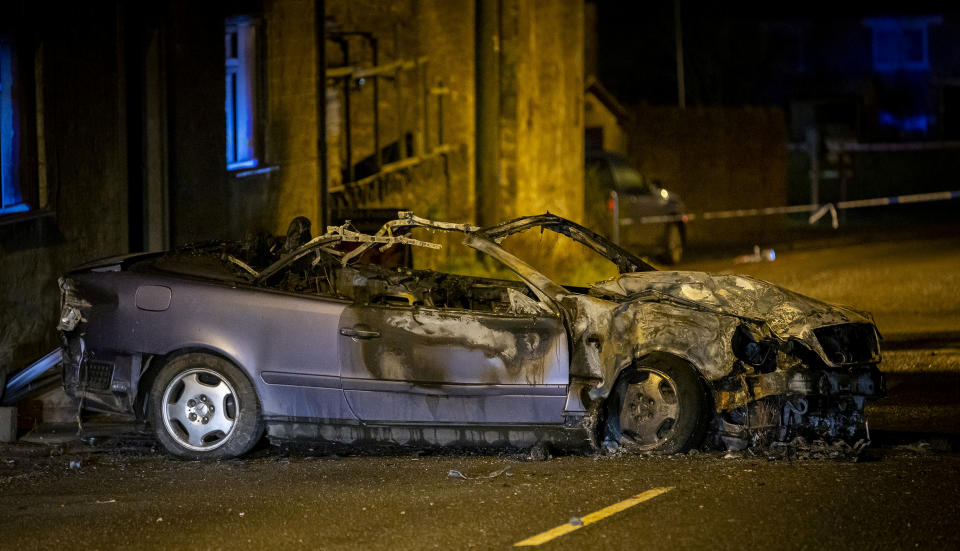 The Mercedes convertible burst into flames after the crash. (SWNS)