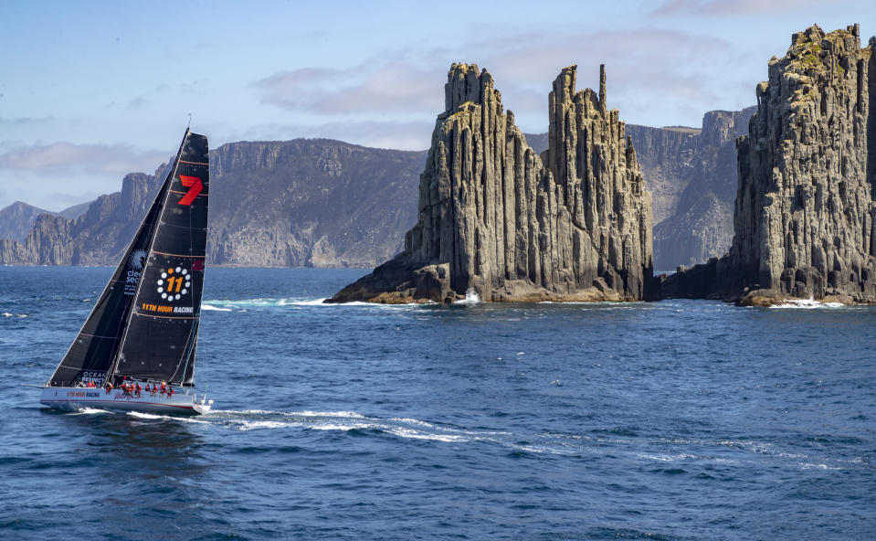 In this photo provided by Rolex/Studio Borlenghi, supermaxi Wild Oats XI gets close to Hobart, Australia, on the way to winning line honors in the Sydney Hobart yacht race, Friday, Dec. 28, 2018. (Carlo Borlenghi/Rolex/Studio Borlenghi via AP)