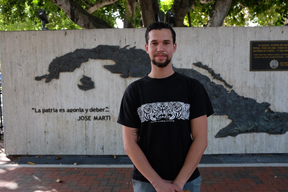 Andy Vila, 21, stands in front of a monument to Cuban poet José Martí in the Little Havana area of Miami on Feb. 25, 2020. Vila, who emigrated to the U.S. from Cuba with his family in 2004, is a supporter of Democratic presidential candidate Bernie Sanders. (Laura Ramirez/Yahoo News)