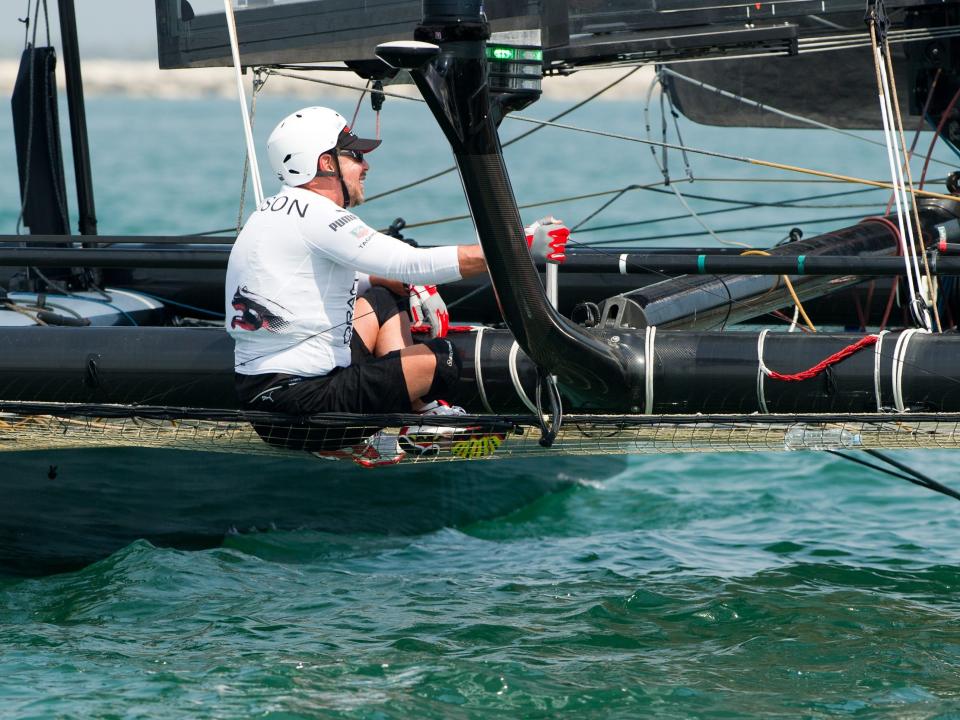 Larry Ellison sailing onboard an Oracle catamaran