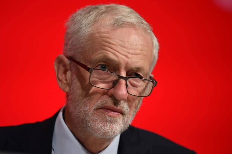 Labour leader Jeremy Corbyn listens to speeches at the party's annual conference