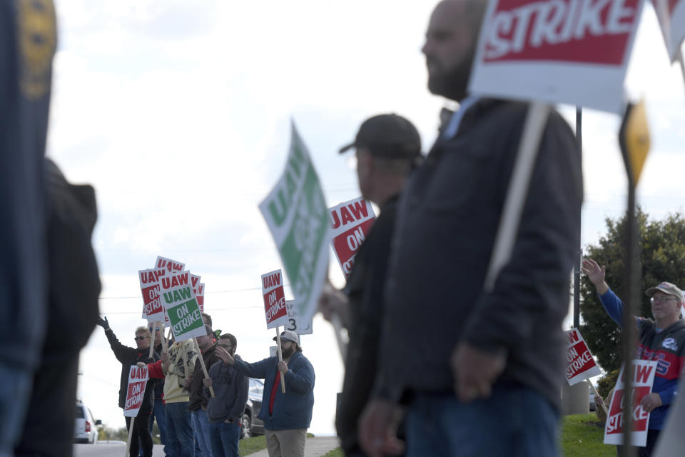 Members of UAW Local 171 picket outside a Mack Trucks facility in Hagerstown, Md. after going on strike Monday, Oct. 9, 2023. Workers voted down a tentative five-year contract agreement that negotiators had reached with the company. (AP Photo/Steve Ruark)